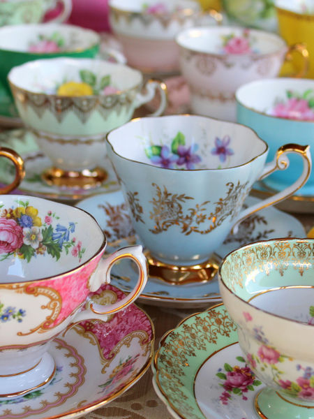 Gilded cups and saucers
