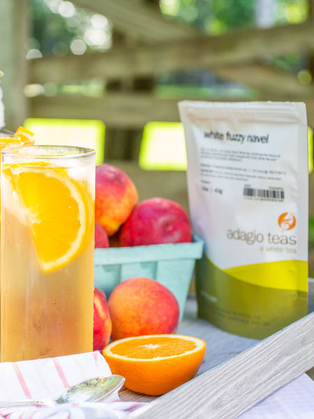 Add flavor with juice. Lemonade or orange juice expands the quantity and enhances the flavor of iced tea.