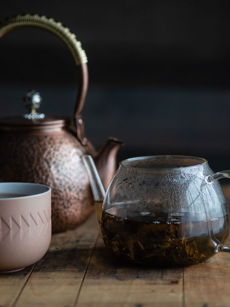 The Sichuan teahouses historically offered tea in distinctive a red copper teapots to pour into a gaiwan of fine Jingdezhen porcelain.