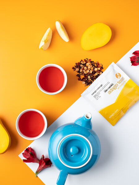 Fresh mango pieces, apple, and hibiscus flowers come together for a tangy, fruity tropical blend. Deep, rosy red cup with a juicy texture and sweet, soft mango finish. Completely caffeine-free and no sugar or other sweeteners. Summertime calls...