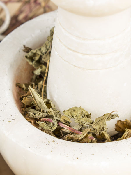 Grinding tea with other herbs + spices
