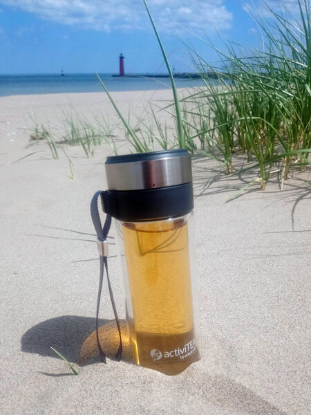  Enjoy loose tea on the go with our portable activiTEA tumbler. It sports a stainless steel infuser, tough borosilicate glass inside and out, a flexible strap for ease of transport, and double-walled construction to keep your tea warm for hours. In response to customer feedback, the infuser had been improved to work with all tea varieties. 