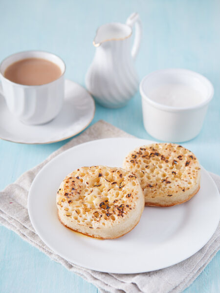 The classic pairing: strong black tea and crumpets.