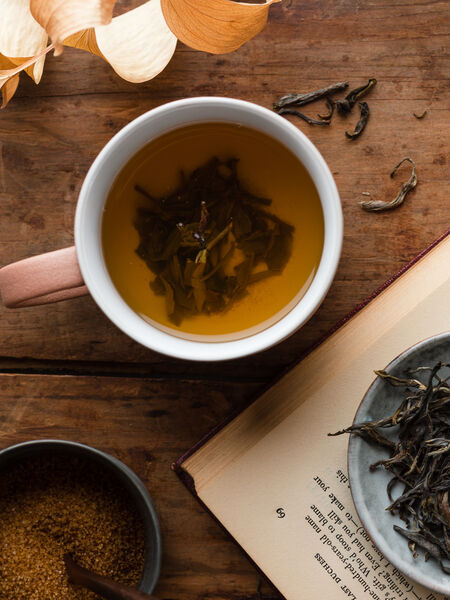Grown at 800 meters above sea level our 2020 Ancient Tree Pu Erh is a Yunnan Big Leaf cultivar and was hand-plucked in early May from 150-year-old trees. This sheng pu erh consists of one bud and 2-3, 15-20 cm long leaves. Once it goes through a 10-minute firing it is then roasted for 5-6 hours at around 70 degrees celsius.