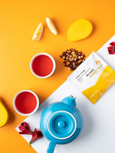 Tea Recipes for Grilling, Salads, and More Fresh mango pieces, apple, and hibiscus flowers come together for a tangy, fruity tropical blend. Deep, rosy red cup with a juicy texture and sweet, soft mango finish. Completely caffeine-free and no sugar or other sweeteners. Summertime calls...