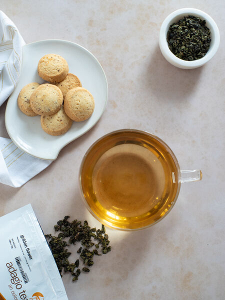Discover Jade, Golden Flower & Ali Shan Oolongs Adagio's Golden Flower oolong that offers sweet, floral notes of honeysuckle, osmanthus and a subtle creaminess. All this lingers and provides well for those who enjoy multiple infusions. Savor its lingering, layered nuances as an everyday, oasis of serenity tea.